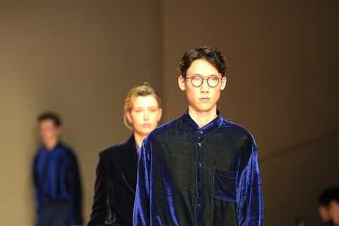 Giorgio Armani launches new era with iridescent colors and a star-studded front row